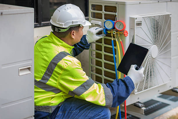 Professional Ac Installation technician working in Magnolia Springs, AL